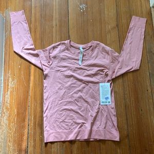 Lululemon swiftly breathe long sleeve size 8. Pink puff.